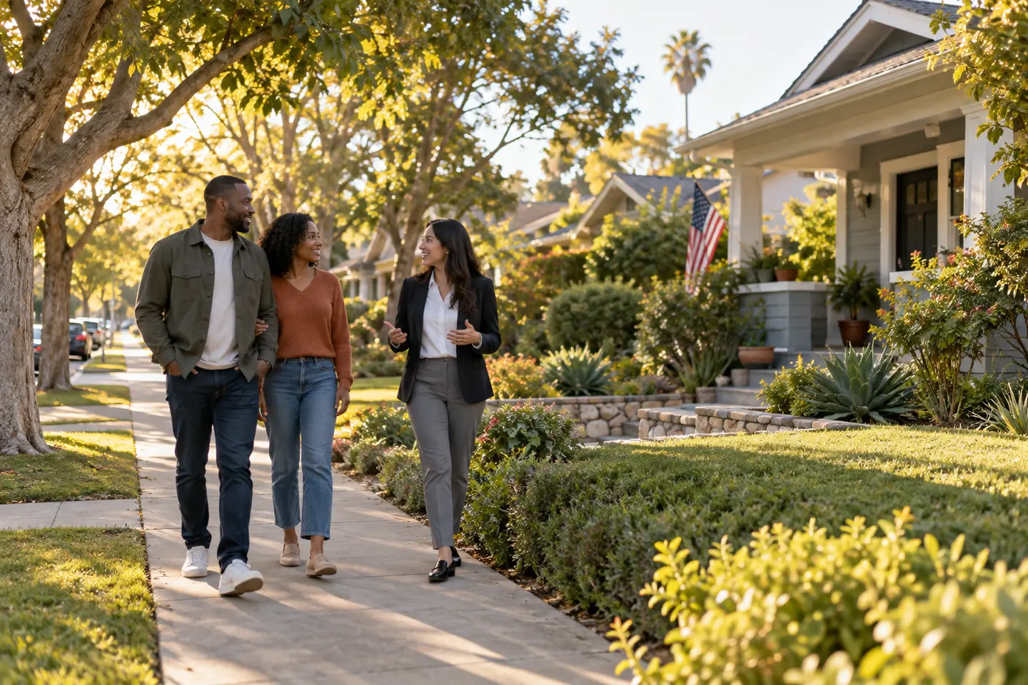 Homebuyers exploring a neighborhood with an advisor
